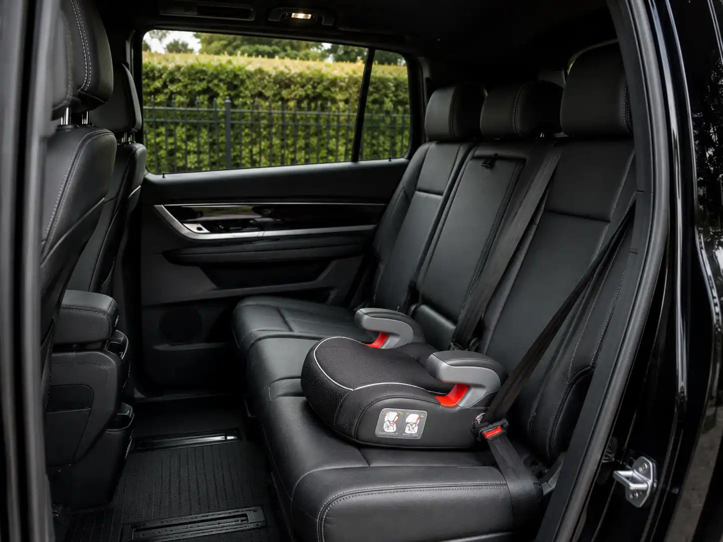 Booster seat prepared for a child in a Melbourne chauffeur vehicle