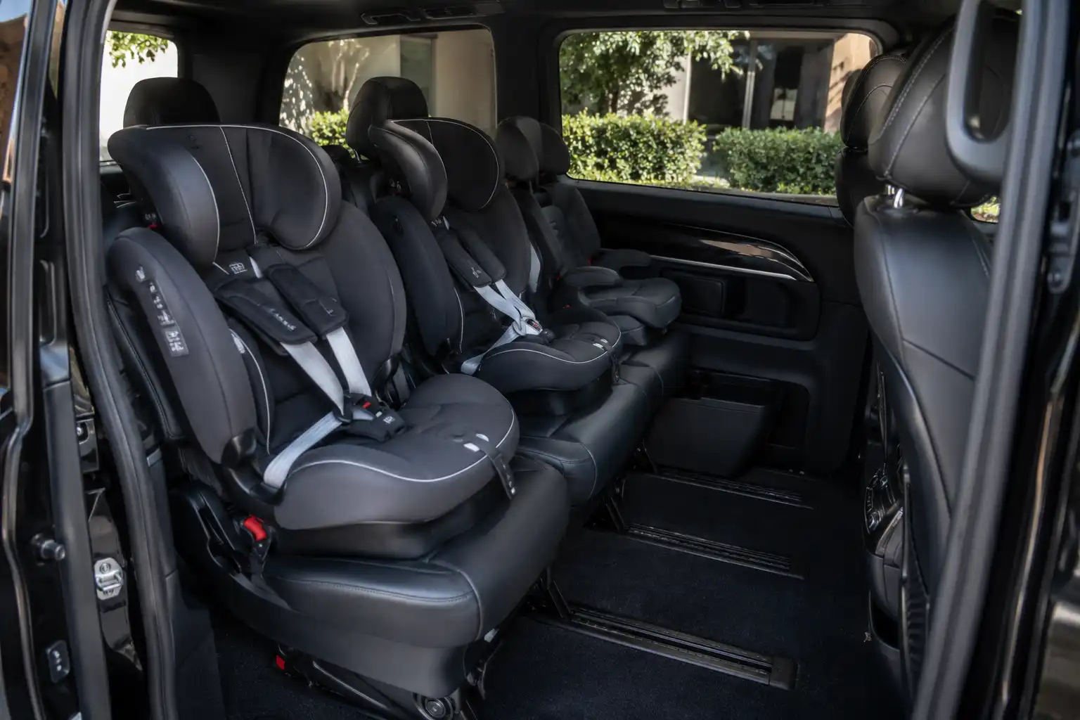 Multiple child seats arranged for a family travelling together in Melbourne